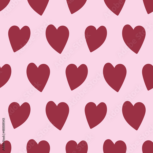Burgundy hearts on baby pink background. Perfect for valentines day contents and products. Use it on fabric, textiles, gift wrap, digital background, wallpaper, product packaging, stationary.