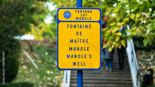 Manoles well sign in Curtea de Arges, Romania photo