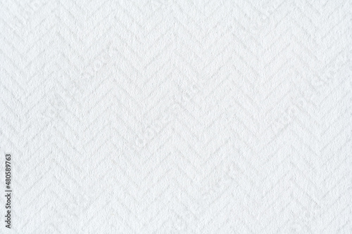 White paper surface with herringbone pattern as texture, background