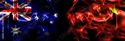 Flags of Australia, Australian vs China, Chinese. Smoke flag placed side by side on black background