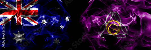 Flags of Australia, Australian vs Japan, Japanese, Kitahiroshima, Hokkaido, Ishikari, Subprefecture. Smoke flag placed side by side on black background photo