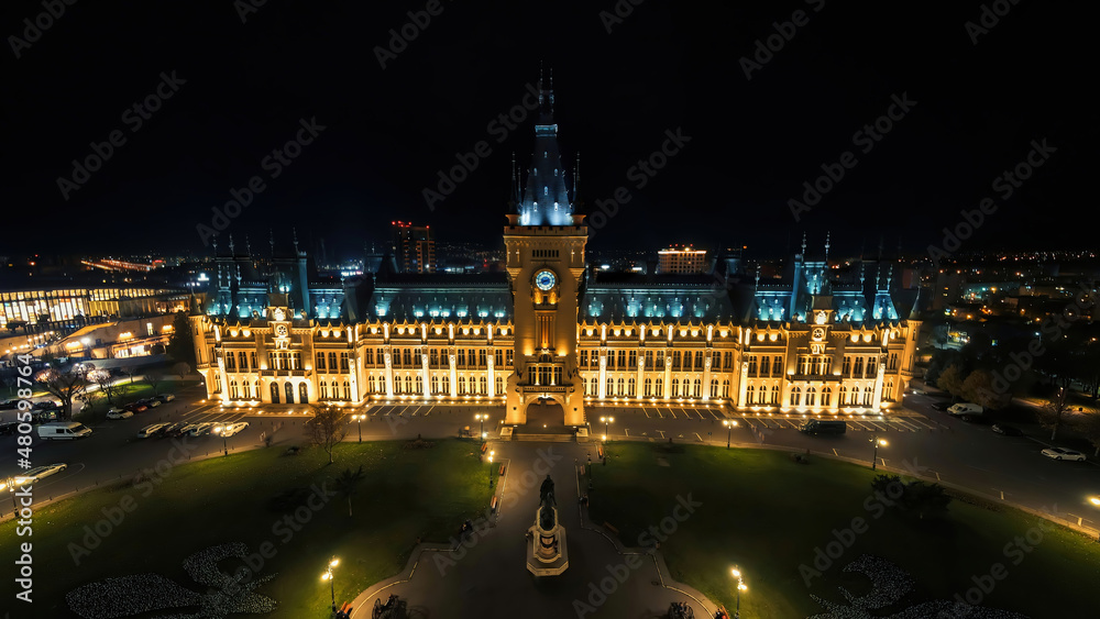 Aerial drone panoramic view of the Palace of Culture in Iasi downtown at night, Romani