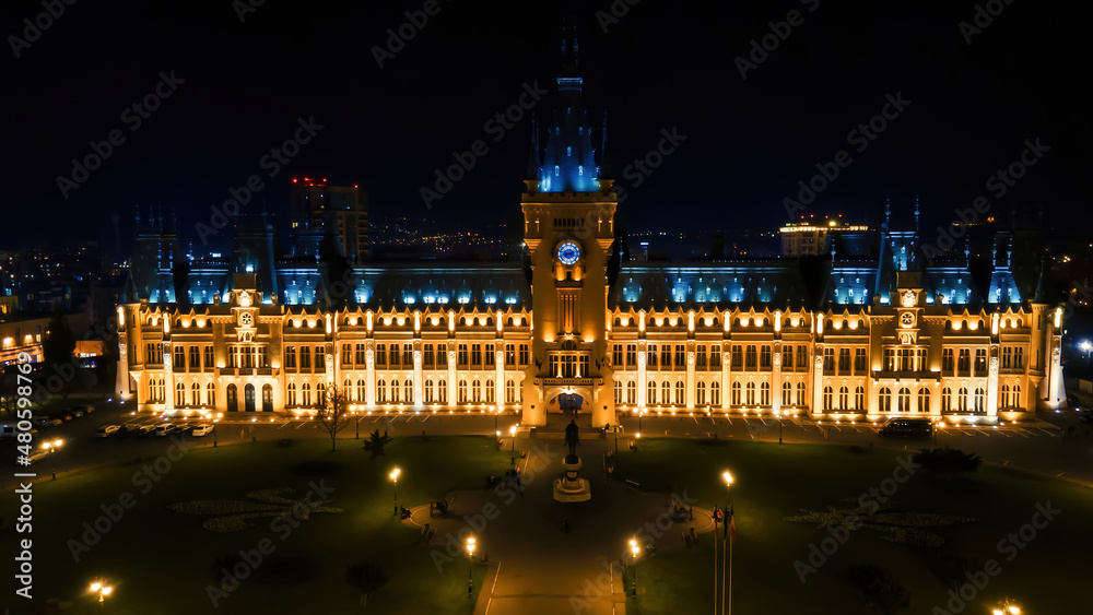 Aerial drone panoramic view of the Palace of Culture in Iasi downtown at night, Romani