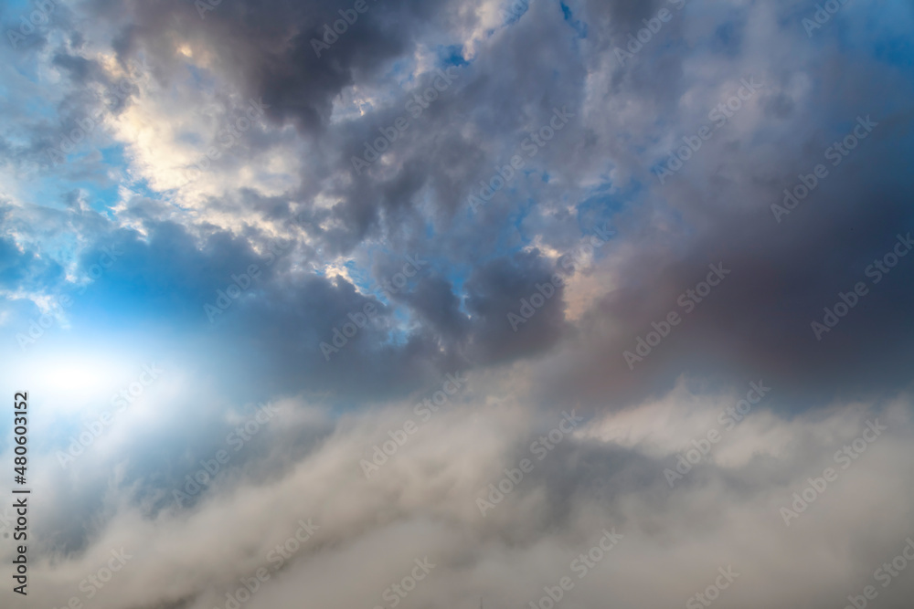 Fantastic fluffy clouds in the sunset sky.
Sky background. Fantastic fluffy clouds in the sunset sky.
Sky background.