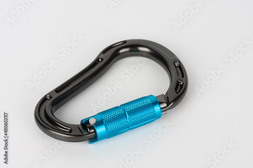New black HMS with automatic twist lock , carabiner climbing equipment on white background.