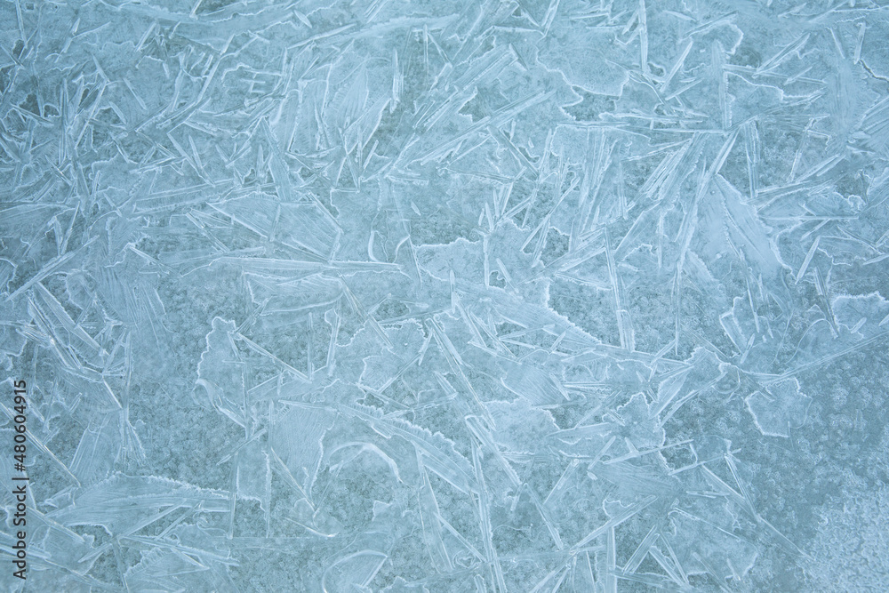 Ice texture background. Frost, ice surface. Close up of decorative winter frozen pattern. Top view. Ice texture background. Frost, ice surface. Close up of decorative winter frozen pattern. Top view.