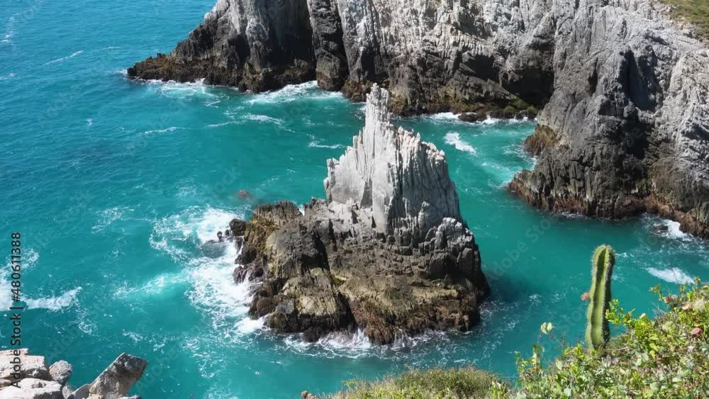 Natural landscape with rocks in the sea, Playa Maruata Mexico