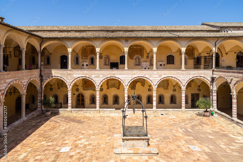 Inner courtyard of the Sacro Convento, the friary next to the Basilica of Saint Francis of Assisi, Umbria, Italy