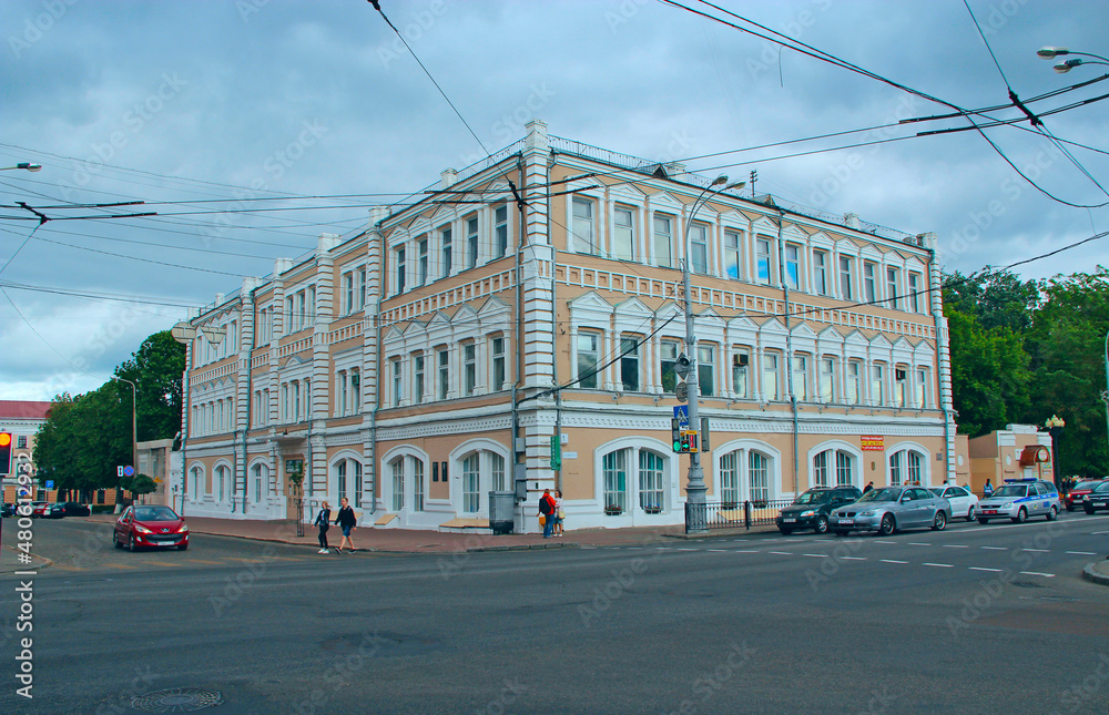 Street in Belarusian city of Gomel. City street with house with balconies.