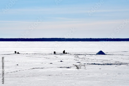 Winter in Manitoba - ice fishing on a lake