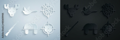 Set Hunter hat, on deer with crosshairs, Hunting gun, bear, Flying duck and Moose head horns icon. Vector