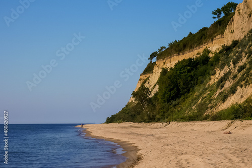 A little-known sandy beach with a steep coastline on the Baltic Sea