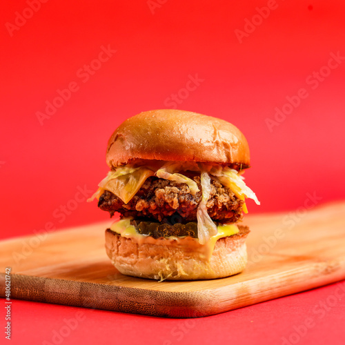 High-Quality Burger on a Red Background