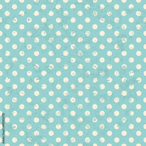 Simple seamless polka dot pattern in blue tones.