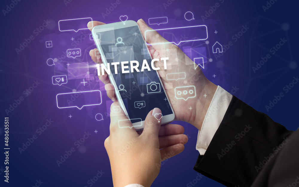 Hand using smartphone with social media concept Hand using smartphone with social media concept
