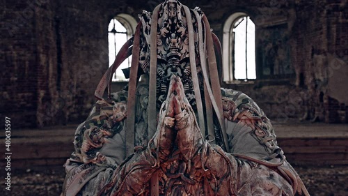 Deity in the middle of a ruined temple