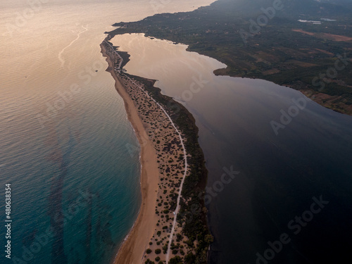 Aerial drone photo of Halikounas Beach separated Lake Korission and Ionian Sea on Corfu Island in Greece photo