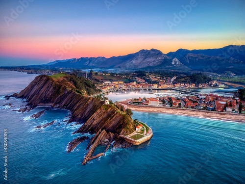 Sunset view of the city of Ribadesella.Asturias, Spain. photo