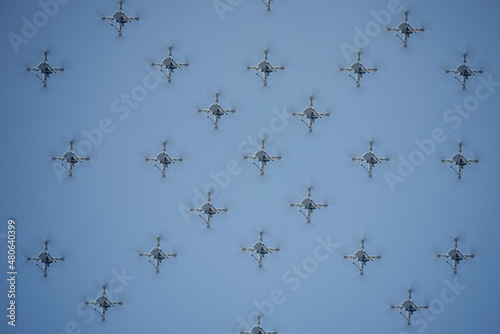 synchronized drones in formation in the air