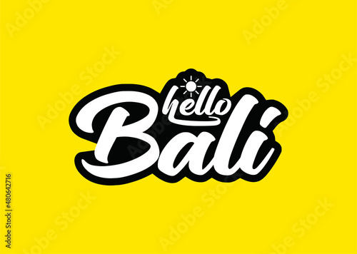 Lettering logo hello Bali on yellow background.