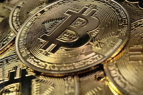 Crypto currency, bitcoin. BTC, Bit Coin. Blockchain technology, bitcoin mining. Macro shot of rotating bitcoins