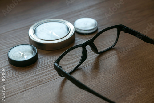 Glasses staring on a compass.