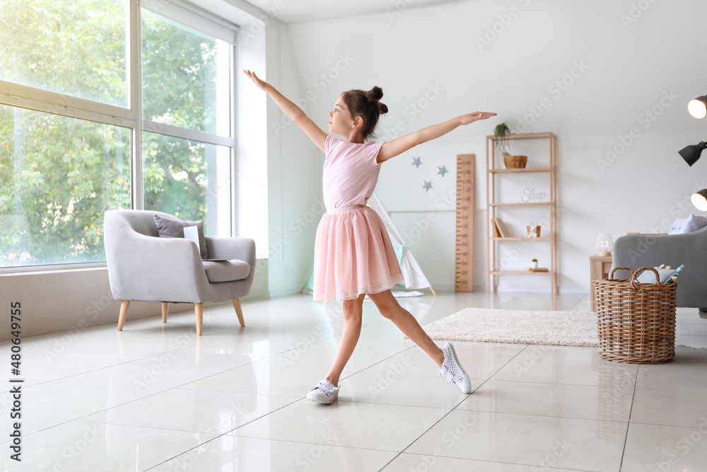 Adorable little ballerina dancing at home Adorable little ballerina dancing at home