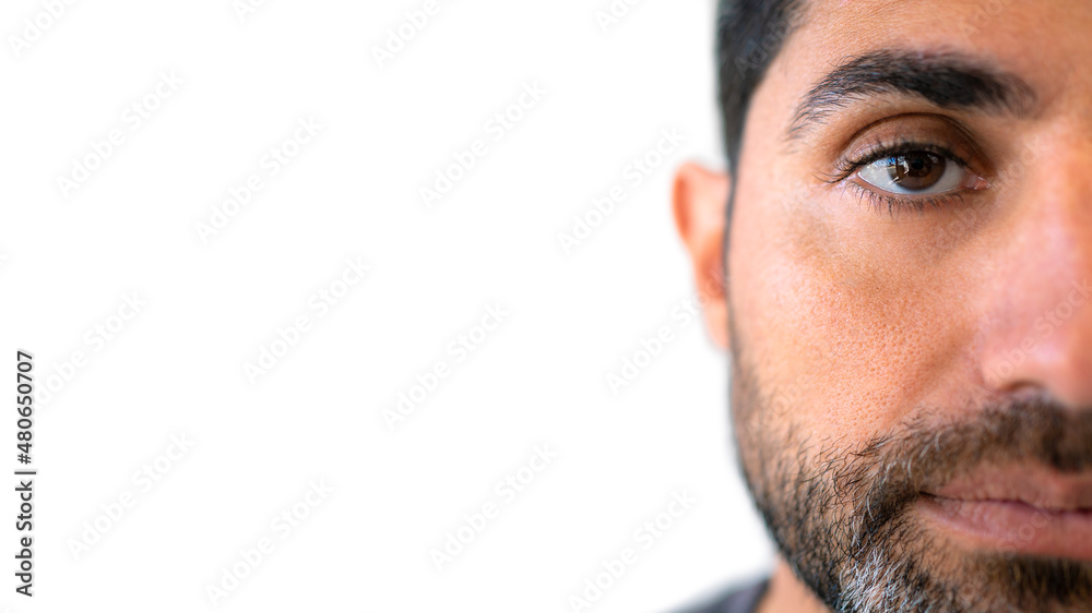 Fototapeta premium Headshot serious male looks confidently at camera isolated over white background