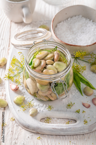 Preparation for pickled broad bean made of vegetables from greenhouse.