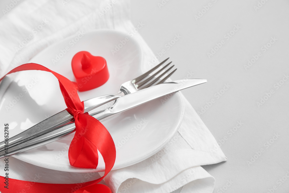 Stylish table setting for Valentine's Day on light background Stylish table setting for Valentine's Day on light background