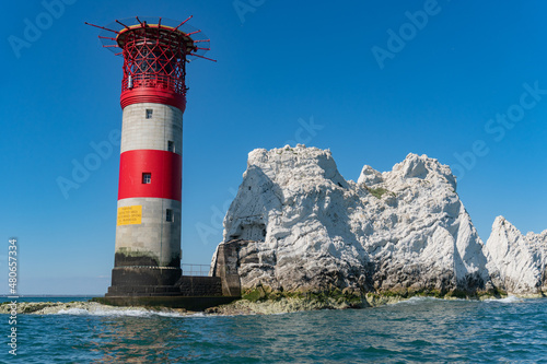 Photo View of The Needles Lighthouse and chalk rocks in Alum Bay, Isle of Wight, Unite