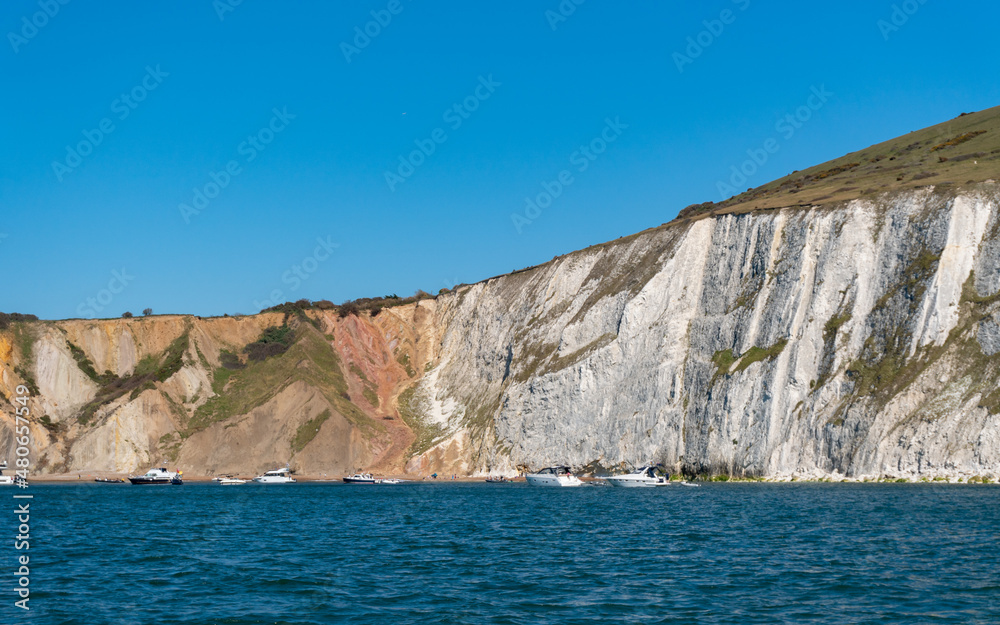 View of sand and chalk cliffs in Alum Bay, near the Needles, Isle of WIght, United Kingdom