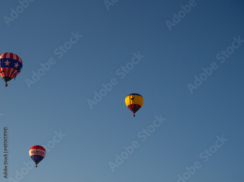 Hot Air Balloon Floating in Clear Blue Sky