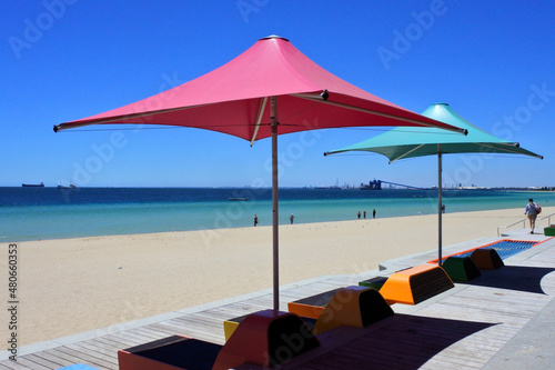 Colorful beach umbrellas on Rockingham city esplanade Western Australia