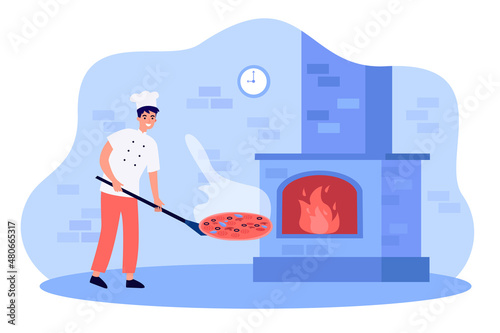 Chef putting pizza on shovel to brick stone oven with fire