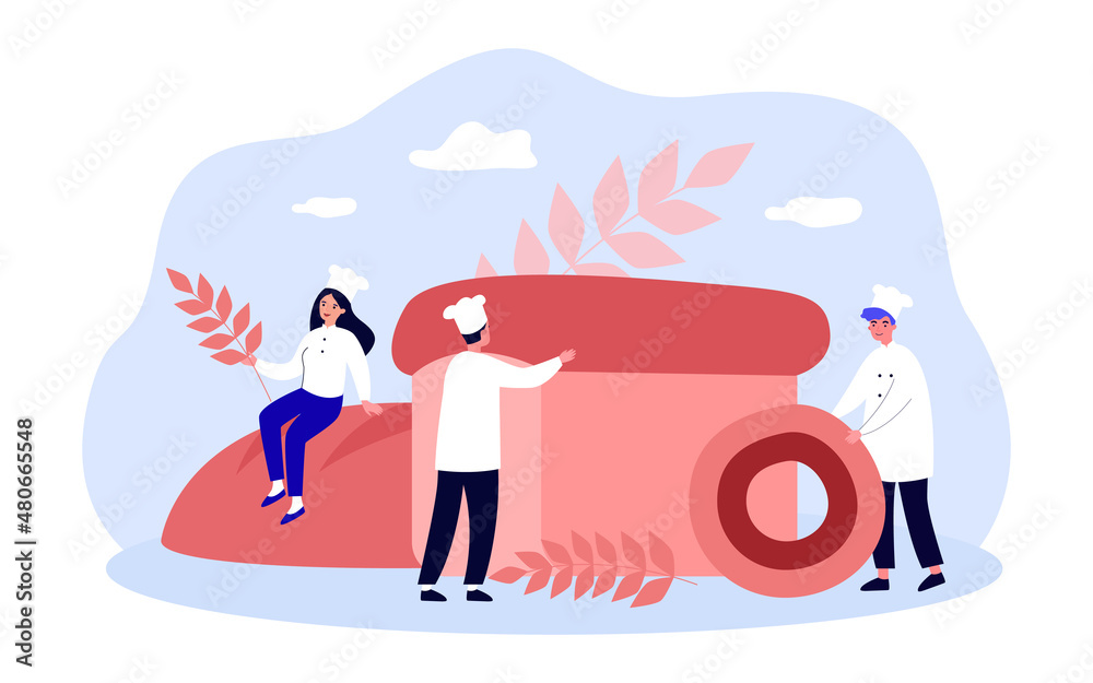 Tiny bakers with baked bread and bagel