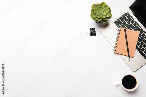 Top view desk flat lay background with computer laptop and office equipment for empty work area copy space concept.