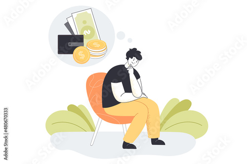 Sad man sitting on chair thinking over financial problems