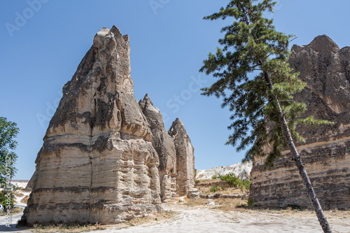 Beautiful view of the valley of love in Cappadocia with mountain peaks in the summer day