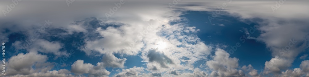 Blue sky panorama with Cirrus clouds in Seamless spherical equirectangular format. Full zenith for use in 3D graphics, game and editing aerial drone 360 degree panoramas for sky replacement.