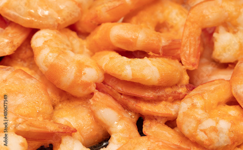 Close-up of boiled shrimp as background.