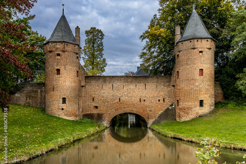 City wall of Amersfoort plays in the water