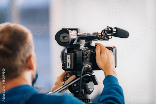 Cameraman Recording a Media Event