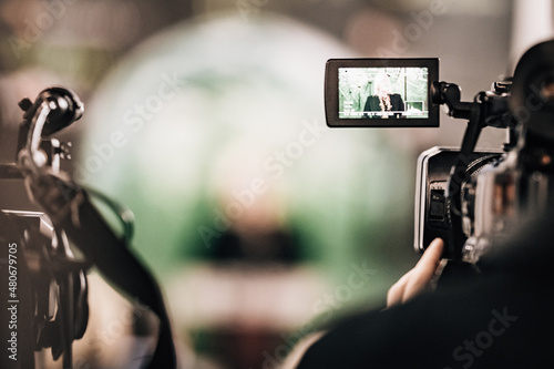 Bild auf Leinwand Cameraman Recording a Media Event