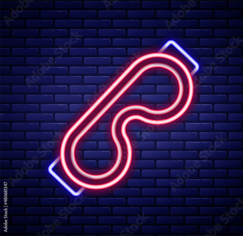 Glowing neon line Eye sleep mask icon isolated on brick wall background. Sleeping mask. Colorful outline concept. Vector