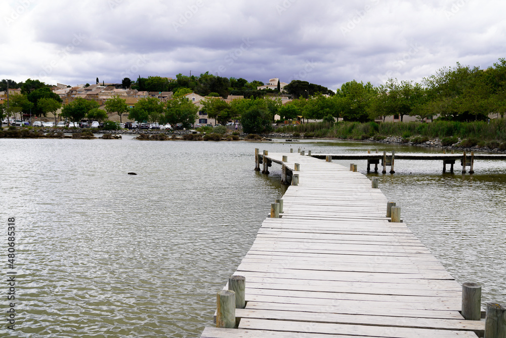 wood pontoon lake of Peyriac de-Mer France across the water
