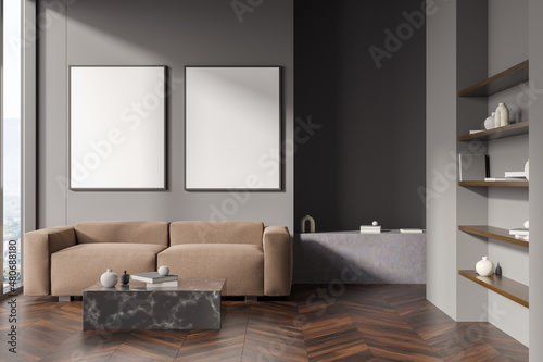 Dark living room interior with two white posters  panoramic window