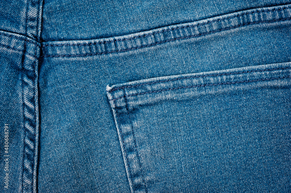 Close up of blue denim texture with sewing. Close up of blue denim texture with sewing.