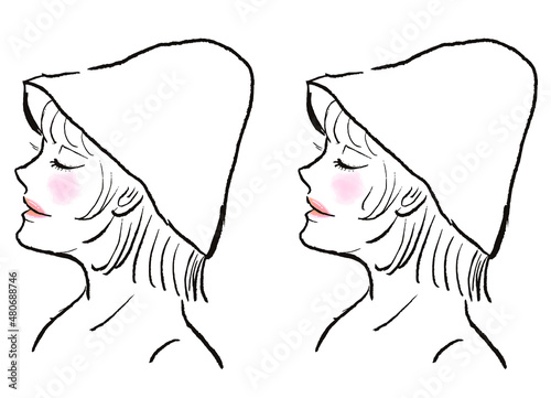 サウナハットをかぶり、サウナで汗をかく目を閉じたボブヘアの女性