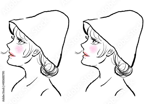 サウナハットをかぶり、サウナで汗をかく目を開けたロングヘアの女性